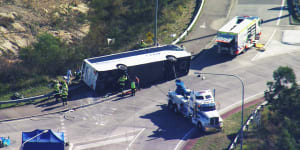 The bus was travelling on Wine Country Drive at Greta when it overturned.