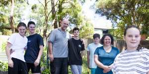 Nervous but happy:Marlie Sinclair,11,right,pictured with her parents and four brothers,is due for her first COVID-19 vaccination on Monday. 