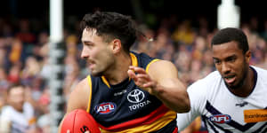 Crows rally around Rankine after racist abuse;Tigers co-captain set for surgery;Stringer details concussion battle