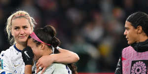 Sophia Smith of USA is consoled by Lindsey Horan.