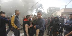 Palestinians evacuate survivors of an Israeli strike in Rafah,Gaza Strip.