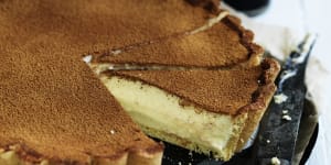 This milky custard tart is dusted with cinnamon.
