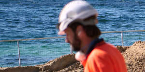 Work is underway to replace the stairs that have caused further delays to the seawall project.