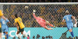 Australia’s Sam Kerr scores her side’s opening goal during the Women’s World Cup semi-final against England at Stadium Australia in Sydney.
