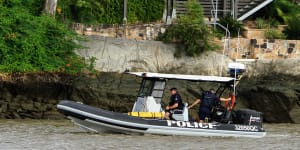 Brisbane River search called off after man seen swimming across