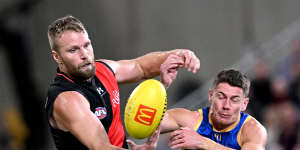 Jake Stringer and Dayne Zorko during the round nine clash between Essendon and the Brisbane Lions.