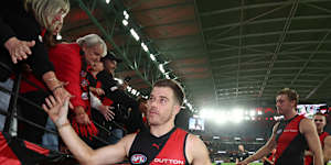 Zach Merrett of the Bombers thanks fans after his club’s win over Sydney.