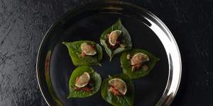 Betel leaves with sweet pork,dried shrimp and macadamia.