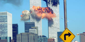 A fiery blast rocks the World Trade Centre after being hit by a plane on September 11,2001.