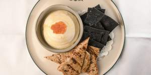 Whipped cod roe with charcoal crackers and roti-like bread.