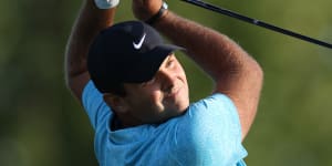 Reed grabs US Open lead,Tiger misses cut