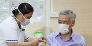 Singaporean Prime Minister Lee Hsien Loong receiving his coronavirus vaccine in January. 