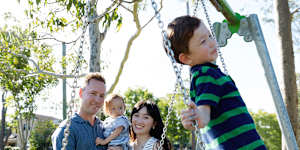 Adam Mather and Tiffany Tung with their baby,Taylen,now 14 months,and four-year-old,Tobie. Taylen contracted measles on a flight home from Bali before he was vaccinated. 
