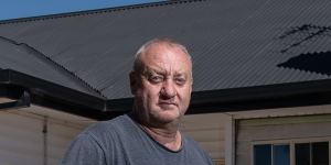 Almost 18 months after his home was flooded,Rick Maloney is still battling his insurance company.