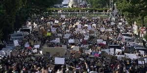 Demonstrators march toward Lafayette Park and the White House to protest against police brutality on Tuesday,June 2.