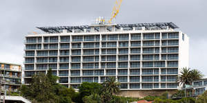 The redeveloped 1960s apartment building is a prominent feature of the Tamarama skyline.