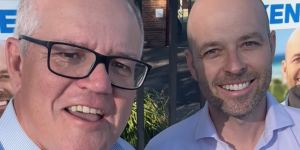 Former Prime Minister Scott Morrison with Liberal candidate Simon Kennedy at a polling booth on Saturday.