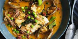 Blue-eye in a spicy broth with clams,asparagus and peas.