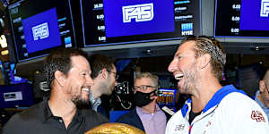 Mark Wahlberg and F45 co-founder Adam Gilchrist at the New York Stock Exchange in July last year.