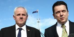 John Madigan,left,pictured with Nick Xenophon,who called him"a man of enormous integrity".