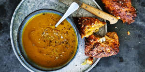 Garlicky sweet potato and chickpea soup served with spiced red onion and feta scones.