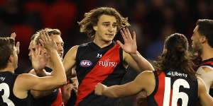 The Bombers celebrate a key early goal from young key forward Harry Jones.