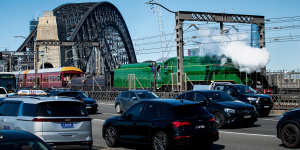 Locomotive 3801 crosses the Sydney Harbour Bridge on Sunday.