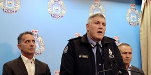 WA Police Commissioner Col Blanch,flanked by WA Police Minister Paul Papalia and WA Premier Roger Cook during a press conference on Sunday morning.