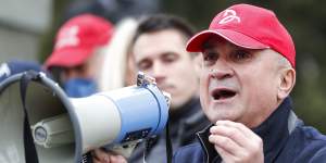 Novak Djokovic’s father Srdjan at a rally in Belgrade. 