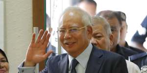 Former Malaysian prime minister Najib Razak walks into a court room at Kuala Lumpur High Court in October. 