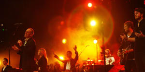 Brian Houston (left) leads the Hillsong entourage at the church's annual conference in Sydney.