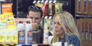 An FBI agent interviews staff at an Auto Zone auto parts store in Florida as part of their investigations into Cesar Sayec jnr. 
