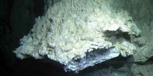 Part of a huge chimney in a hydrothermal vent in the Atlantic Ocean. Oceanographers and biologists believe that the earliest forms of life began in places like this.