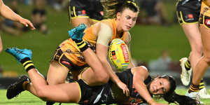 Tight tussle:Richmond’s Emelia Yassir is tackled.