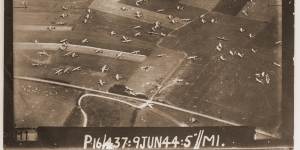 Gliders lie scattered on the fields of France after landing on D-Day.