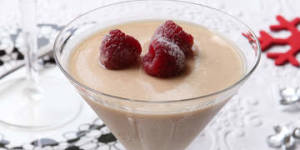 Eggnog panna cotta with frosted berries.