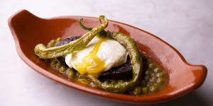 Morcilla,peas,fried egg and mint.