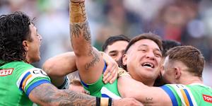Josh Papalii celebrates scoring a try in his record-equalling 318th game for the Raiders.