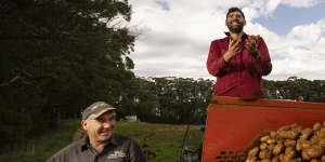 Jon Hill with his son Ryan Hill on their potato farm in Wildes Meadow in NSW. 