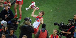 Alex Johnson with the 2012 premiership cup.
