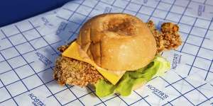 The schnitty sandwich,filled with panko-crumbed chicken,lettuce and cheese on an olive oil bun.