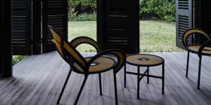 “The house has many beautiful verandahs which we restored back to their original state,then added shutters to create outdoor rooms,” says Lou. The “Banjooli” chairs are by Moroso.