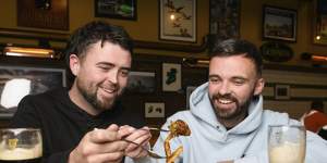 Cammy Millar and Sean Coughlan share Shea’s Irish pub spice bag.