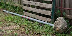A neighbour said Viki Graham salvaged this downed signpost from the street.