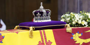 The Imperial State Crown rests on the Queen’s coffin.