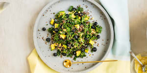 Kale,quinoa and blueberry salad with coconut dressing.
