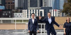Mooney Valley council candidate Pierce Tyson,Lord Mayor candidate Nick Reece and Port Phillip council candidate Heather Consulo at the solar array on top of Wilson Hall at the University of Melbourne.