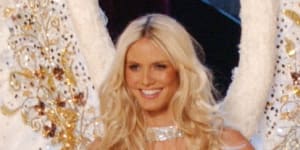Model Heidi Klum with the signature angel wings at a Victoria’s Secret fashion show in 2003.
