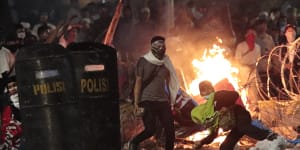 Why are Indonesians dying on the streets of Jakarta a month after their election?