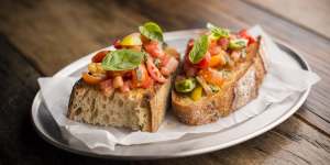 Heirloom tomatoes and basil bruschetta is a lovely last gasp of summer.